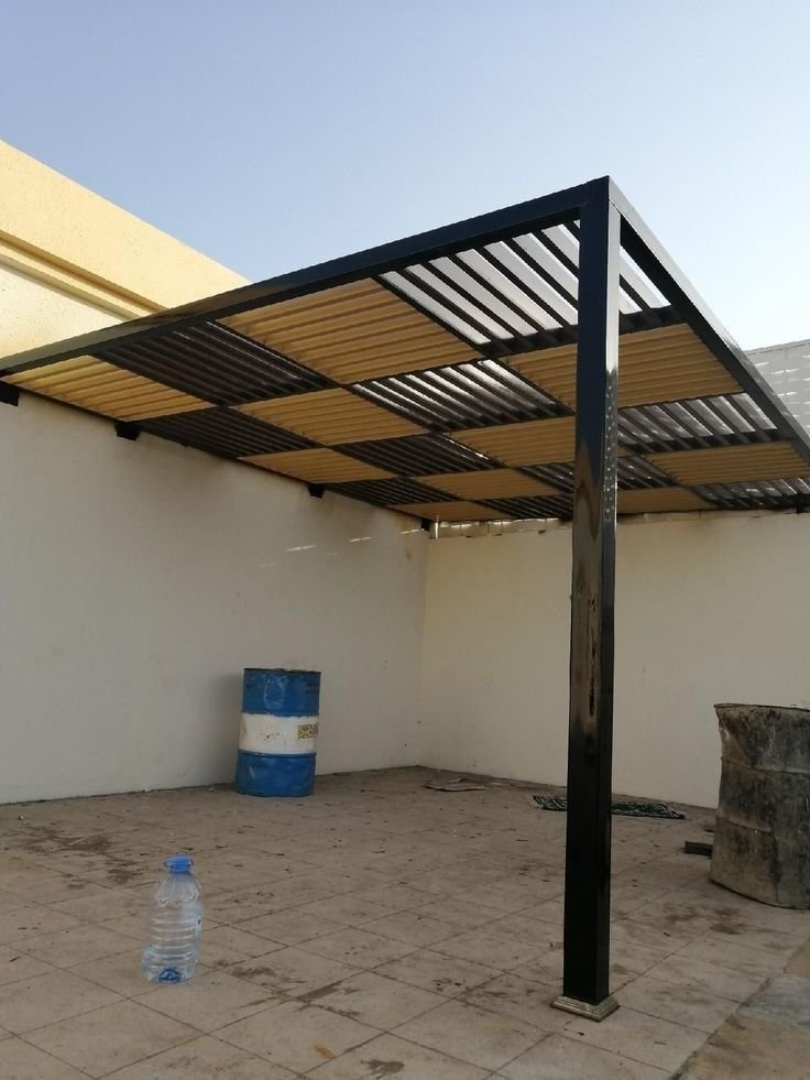 تركيب برجولة خشبية في حوش منزل بالرياض